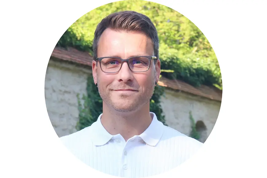 Portraitfoto von Dr. Christian Stößel